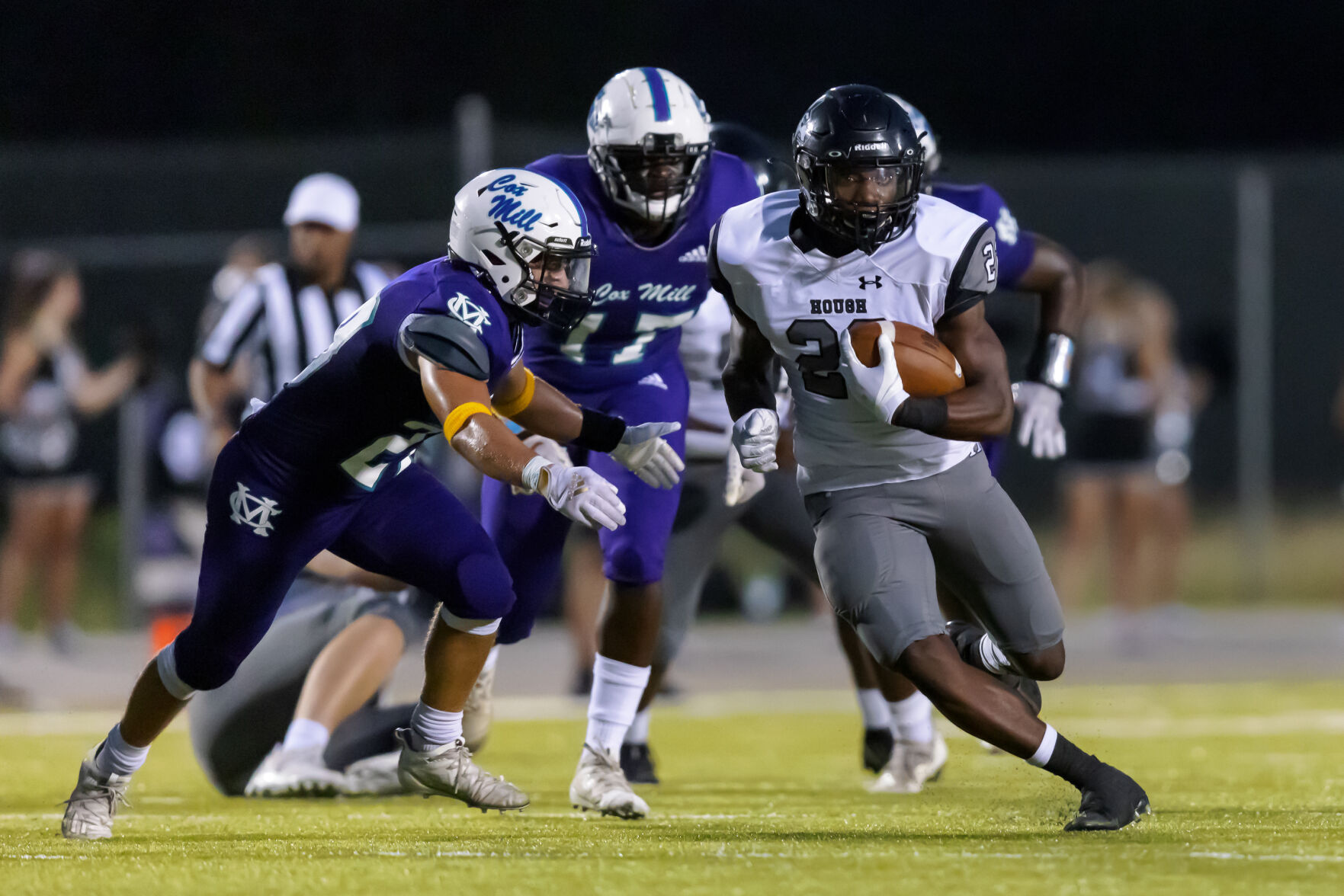 The Hough Huskey defeated the Cox Mill Chargers 48-7 on Friday night at Cox Mill High School.